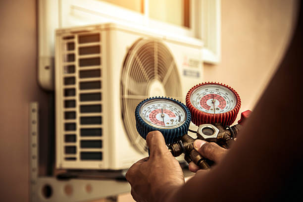 Professional Hvac technician working in Paxton, MA